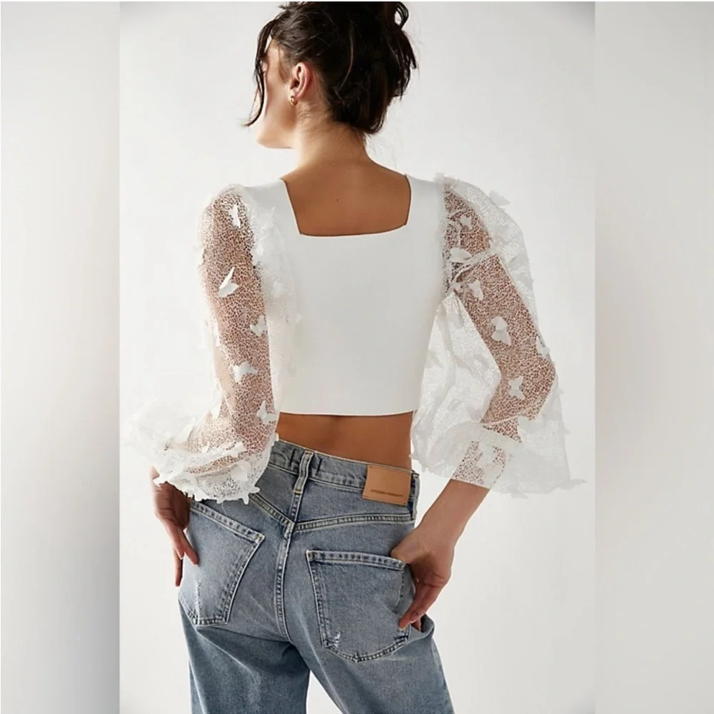 Free people white flutter long sleeve crop top